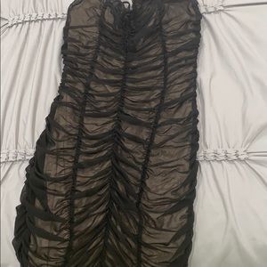 Black and nude ruffed bodycon dress